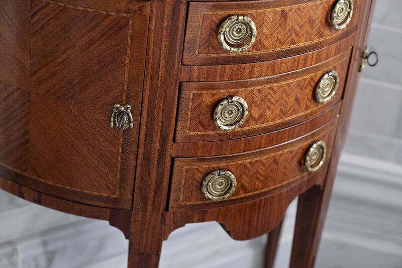 A Small Demi Lune Tulipwood Directoire Style Commode